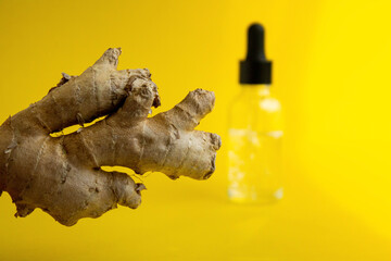 Oil with ginger aroma. Cosmetic serum with ginger root extract.
