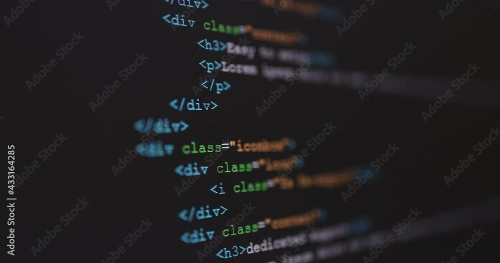 Leinwandbilder 4K Close up shot HTML tag code on PC Monitor scroll down. Background concept for programming and coding web development.