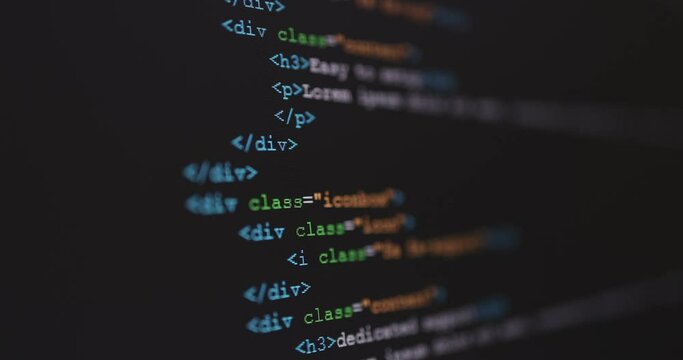 4K Close up shot HTML tag code on PC Monitor scroll down. Background concept for programming and coding web development.