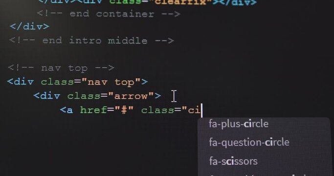 4K Close up shot HTML tag code on PC Monitor scroll down. Background concept for programming and coding web development.
