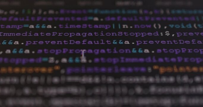4K Close up shot programming tag code on PC Monitor scroll down. Background concept for programming and coding web development.
