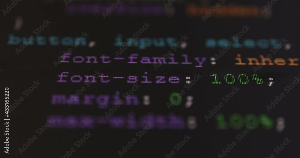 Fototapete 4K Close up shot CSS tag code on PC Monitor scroll down. Background concept for programming and coding web development.