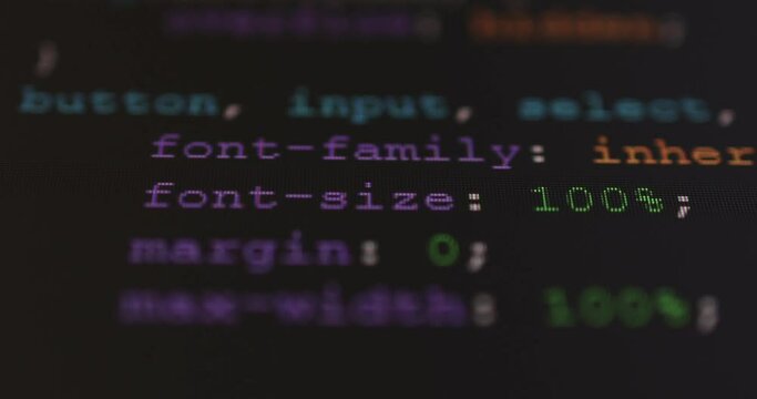 4K Close up shot CSS tag code on PC Monitor scroll down. Background concept for programming and coding web development.