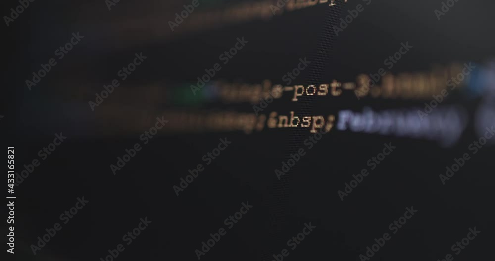 Leinwandbilder 4K Close up shot shift focus HTML tag coding on PC Monitor. Background concept for programming and coding web development.