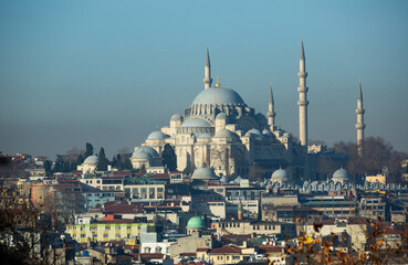 Scenic modern Istanbul cityscape overlooking Fatih district and ancient Suleymaniye Mosque on sunny winter day, Turkey..