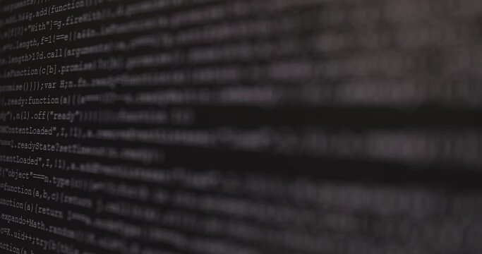 4K Close up shift focus shot programming tag coding on PC Monitor. Background concept for programming and coding web development.