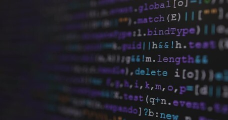 4K Close up shot programming tag code on PC Monitor scroll down. Background concept for programming and coding web development.