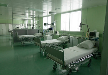A hospital room with empty beds in a clinic or hospital.
