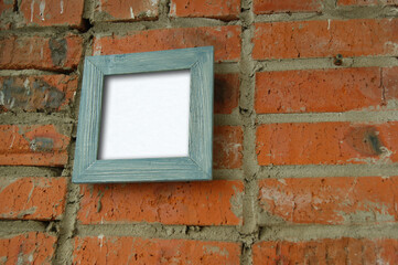 Empty frame on brick wall background. Copy the village frame and paste your drawing _003