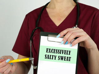 Healthcare concept about EXCESSIVELY SALTY SWEAT with inscription on the page.