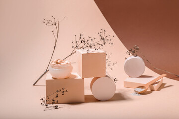 Composition with jars of cosmetic clay on color background