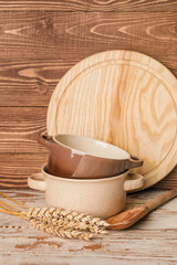 Set of kitchen utensils on wooden background
