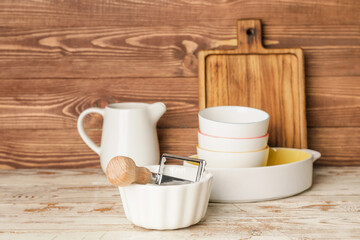 Fototapeta na wymiar Set of kitchen utensils on wooden background