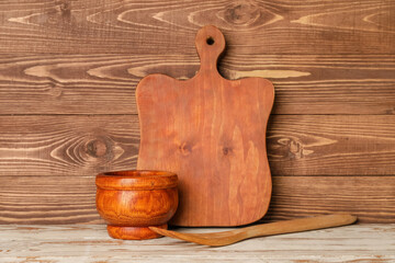 Set of kitchen utensils on wooden background