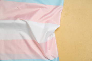 Transgender flag on color background