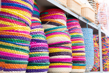 Colorful baskets and utensils made by hand with natural fiber. Crafts made with vegetable fiber in Mexico.