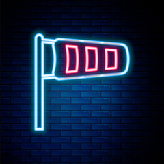 Fototapeta premium Glowing neon line Cone meteorology windsock wind vane icon isolated on brick wall background. Windsock indicate the direction and strength of the wind. Colorful outline concept. Vector