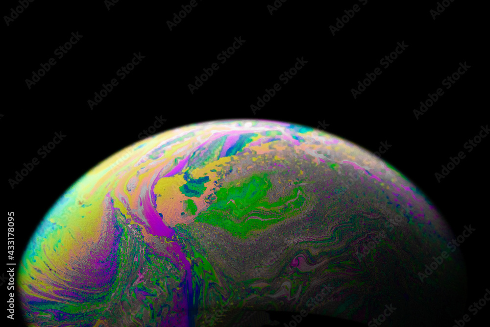 Wall mural colourful bubbles. abstract galaxy background with globe planet earth in universe space with sunligh