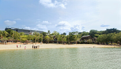  View of Sentosa Palawan Beach. People resting on the shore
