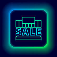 Glowing neon line Shopping building or market store icon isolated on black background. Supermarket sale concept. Colorful outline concept. Vector