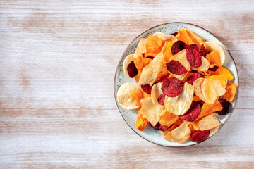Vegetable chips, shot from above with a place for text