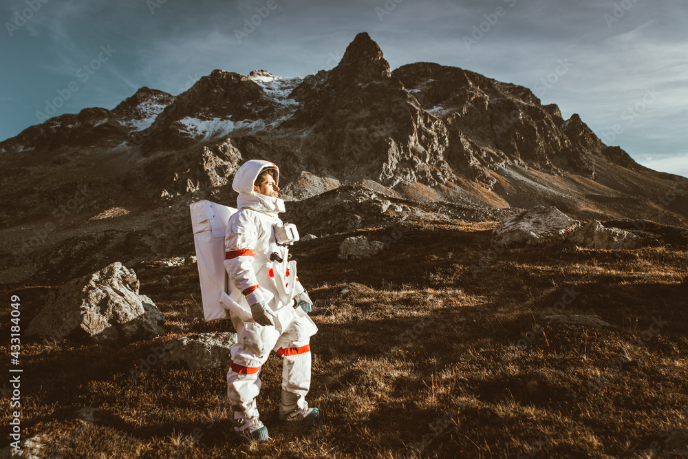 Poster astronaut exploring a new planet. searching for a new home for humanity. concept about science and n