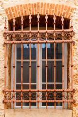 Facade window of an old European Mediterranean town. Close-up. Texture.
