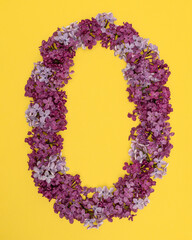 The letter D is lined with lilac flowers on a yellow background. For lettering, composing words.