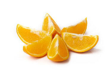 Orange slices ispread out in the form of the sun solated on white background.