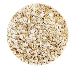 Organic barley flakes isolated on white circle background.