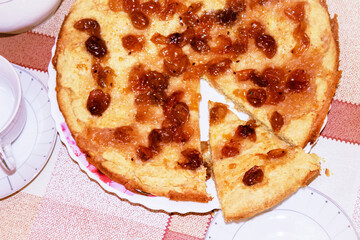 Tea party. Delicious pie with berry jam close-up.