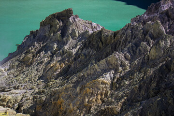 Volcano mountain texture, layer of rock at Kawah Ijen. The sheer sulfur walls of the Mount Ijen crater,  Banyuwangi, East Java, Indonesia. 
