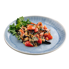 Isolated plate of eggplant salad with tomato on the white background
