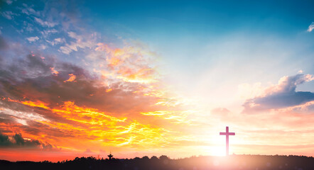Fototapeta na wymiar Religious day concept: Silhouette cross on mountain sunset background