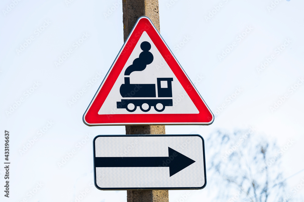 Poster road sign red triangle with train pattern