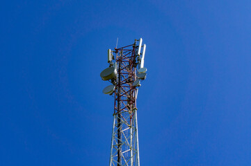 Mobile tower 5G against the blue sky
