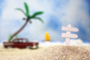 Sign on Tropical Beach with Vintage Hot Rod