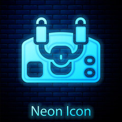 Glowing neon Aircraft steering helm icon isolated on brick wall background. Aircraft control wheel. Vector