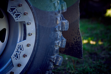 4x4 off-road car wheels on grass. Off-road tire