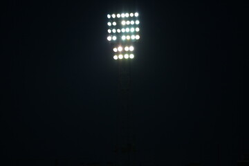 Obraz premium industrial electric spotlights of a light tower for lighting the event at night