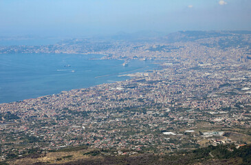 gulf of the great city of Naples in Southern Italy with a cruise ship and many houses near the sea seen from the volcano vesuvius