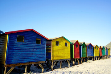Fototapeta premium Bright beach changing rooms at Muizenberg, Cape Town