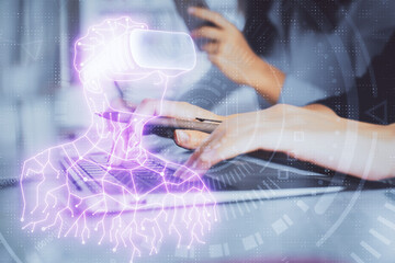 Double exposure of woman hands typing on computer and man in AR glasses drawing. Education concept.