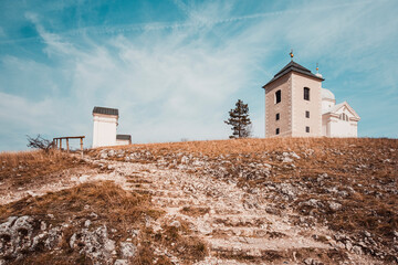 Fototapeta premium Holy Hill dominant landmark in Mikulov. Chapel of Saint Sebastian, bell tower and Holy Sepulchre