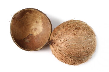 Hollow coconut sliced in half, two halves isolated on white background, top view