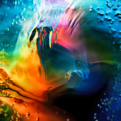 Abstract colorful rainbow liquid background. Swirls of color around the center focusing attention. Rendered design element