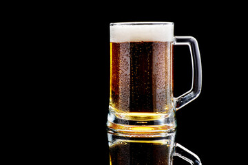 Studio shoy of Mug with beer on dark background