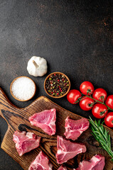 mini raw Beef T-Bone steak on stone background with copy space for your text