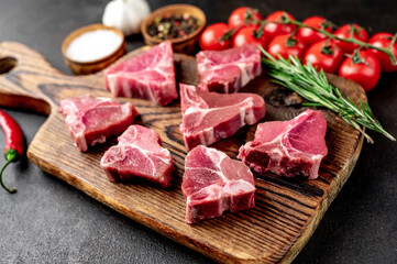 mini raw Beef T-Bone steak on stone background