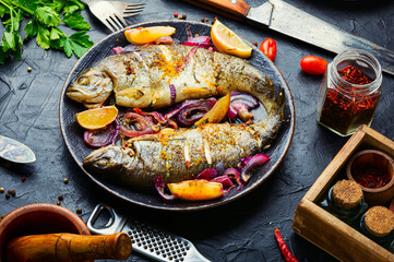 Two grilled trouts with lemon,fish dish